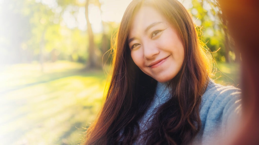 Portrait image of a happy beautiful asian woman